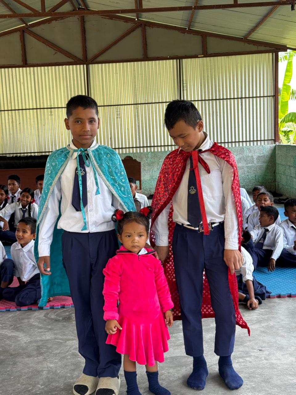 Children in their school performance costumes